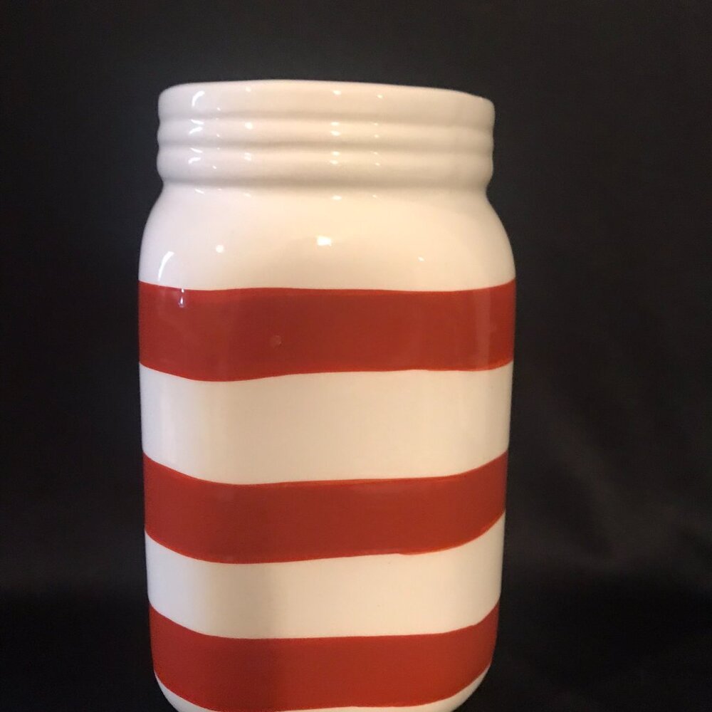 white and red striped vase